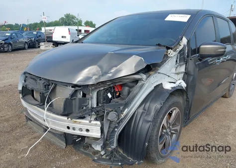 2019 Honda Odyssey Touring z USA, uszkodzony, nr VIN 5FNRL6H83KB103283